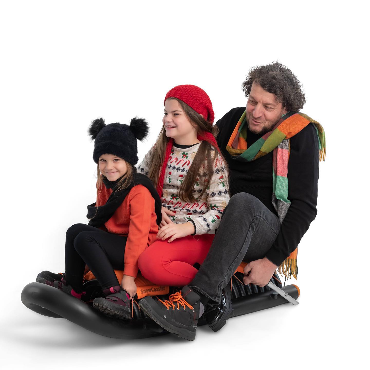 Family on SnowCoaster